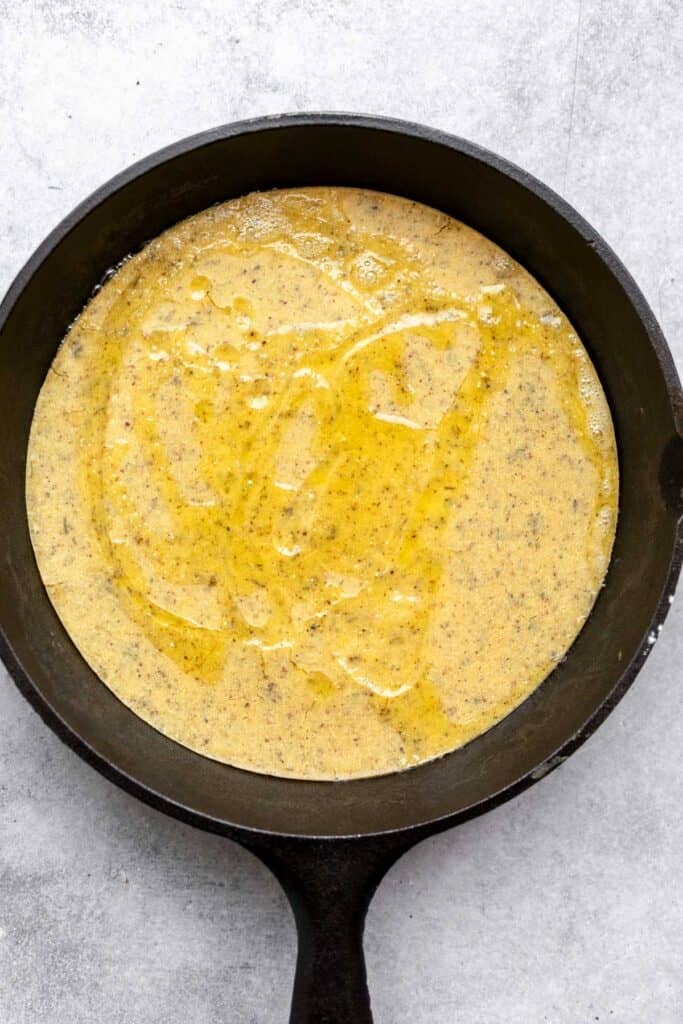 crust in the pan after baking before adding toppings