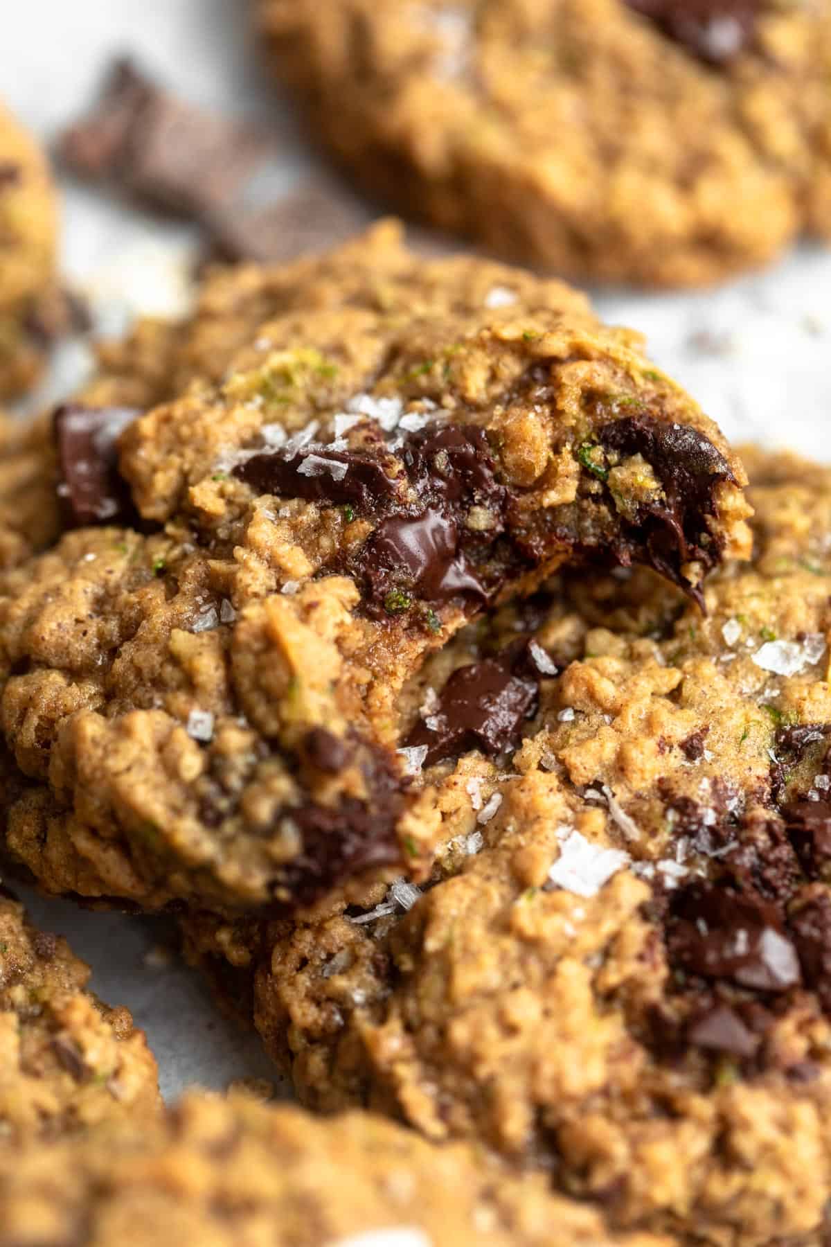 bite taken out of the gluten free zucchini cookies with chocolate chips