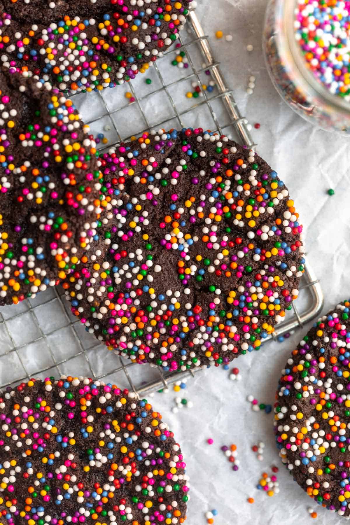 overhead shot of the chocolate sprinkle cookies on a wire rack