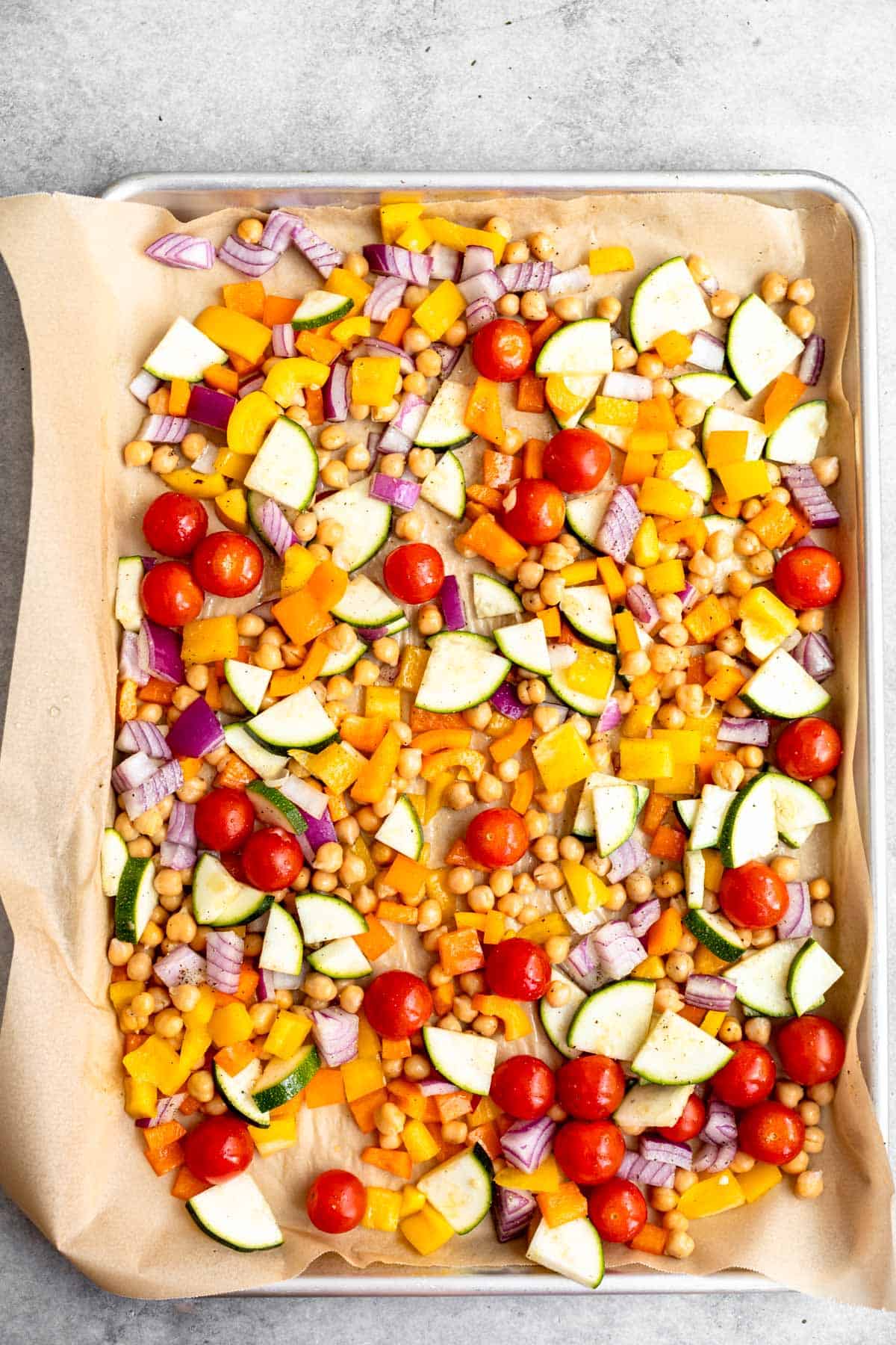 veggies on a baking sheet before cooking