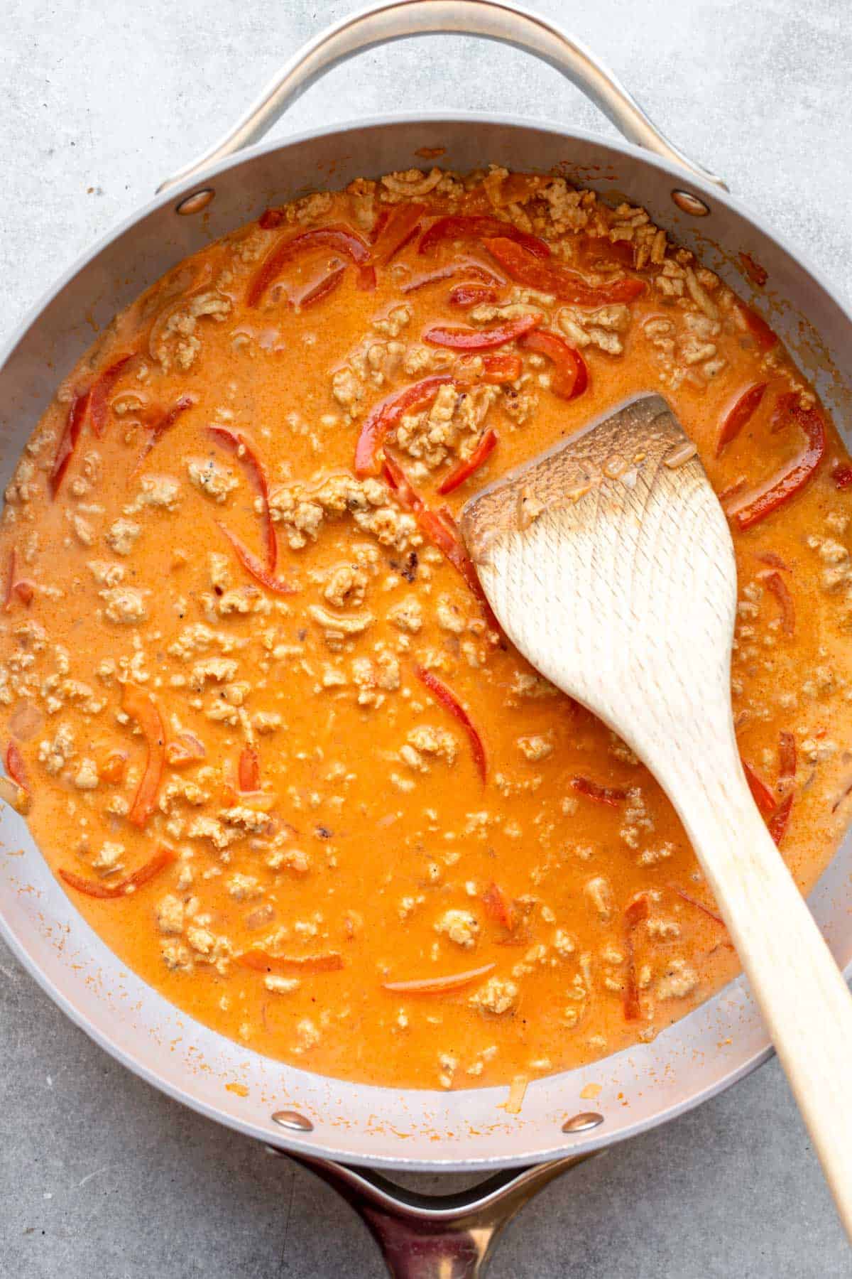 simmering the sauce with the emat