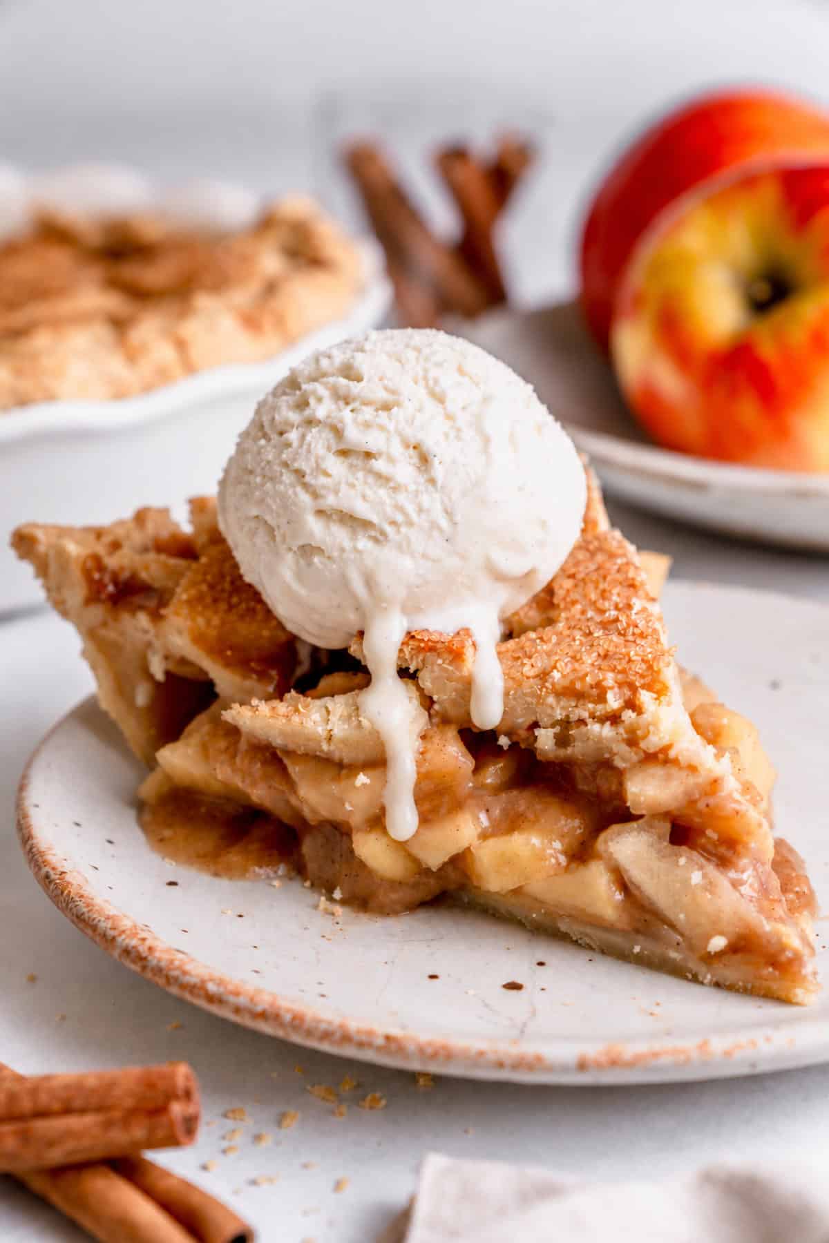 gluten free apple pie on a plate with ice cream on top