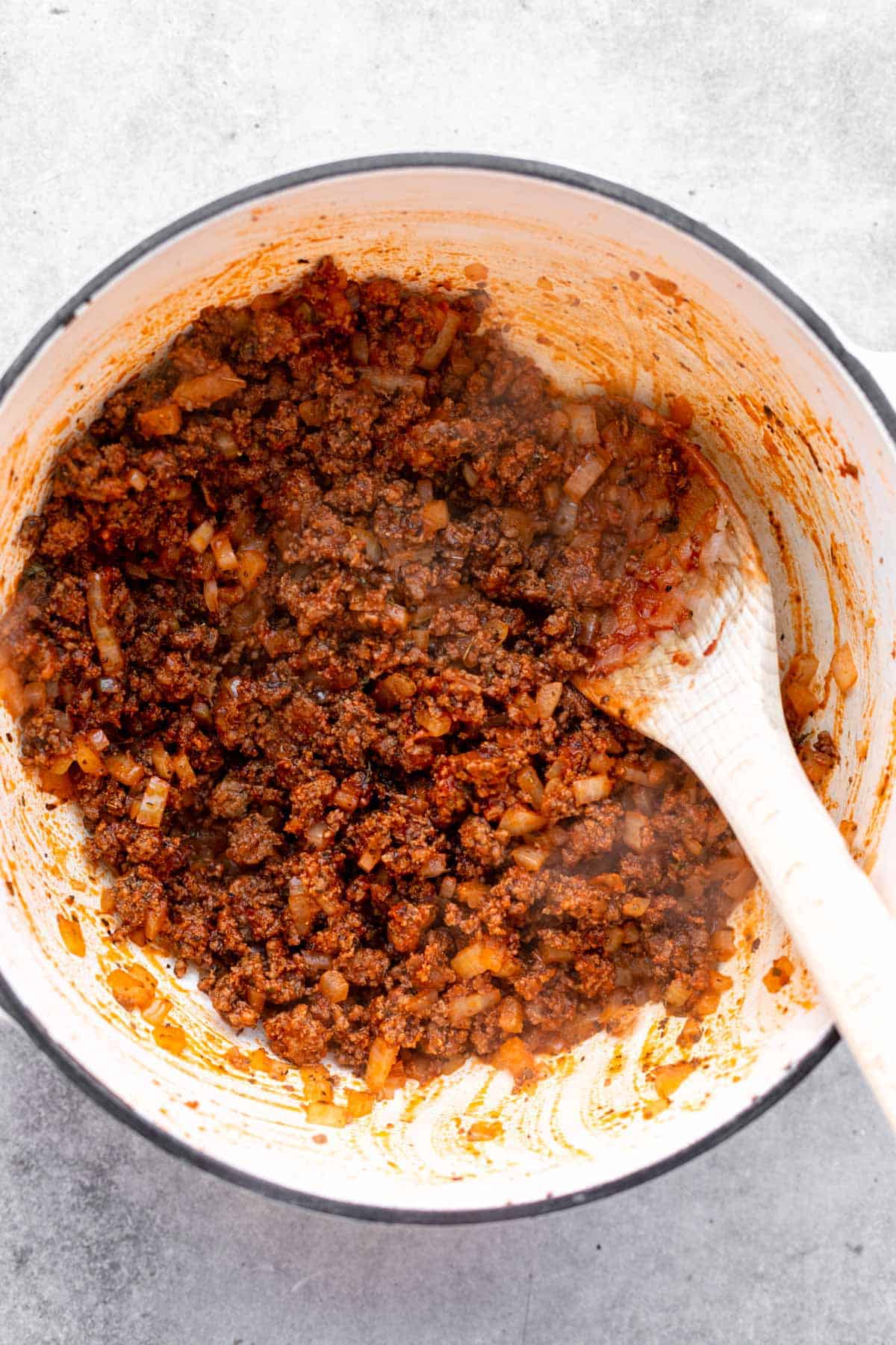 beef and onion cooking in a pot
