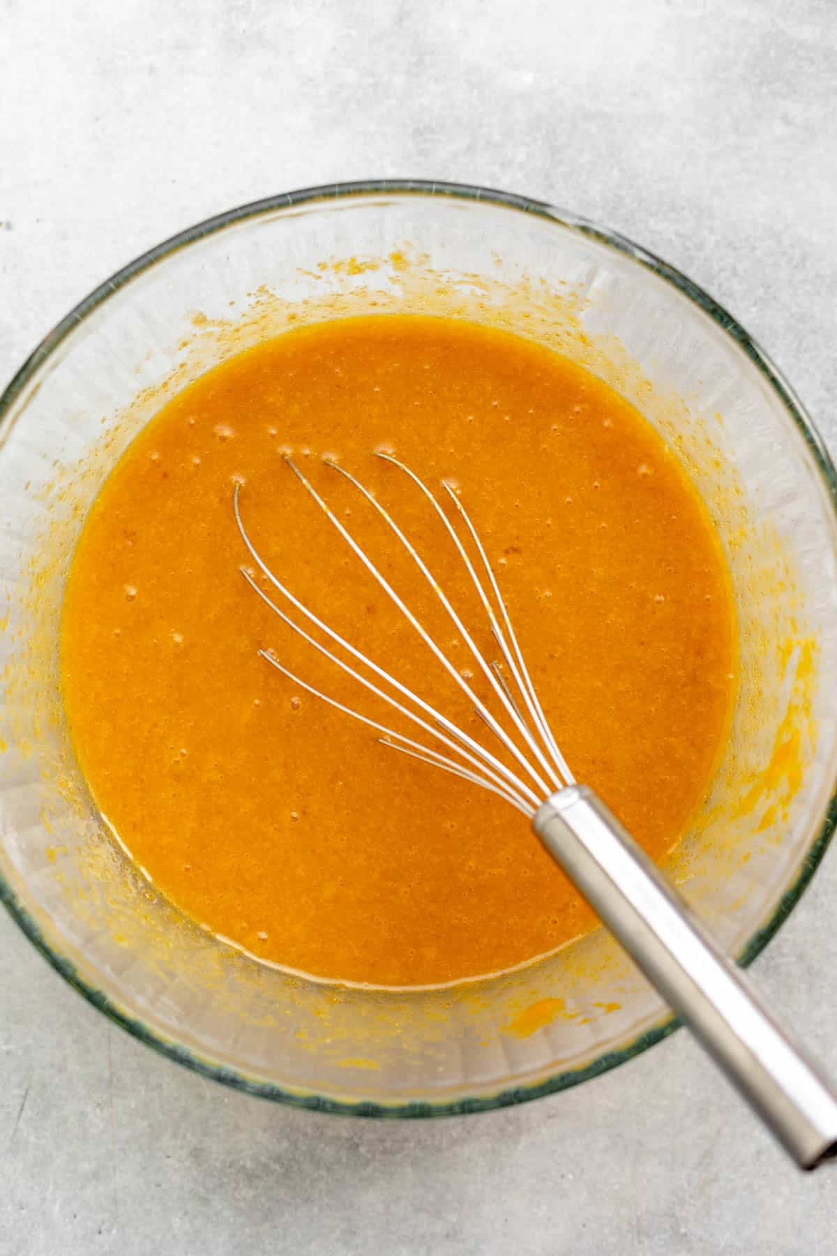 wet ingredients whisked in a bowl