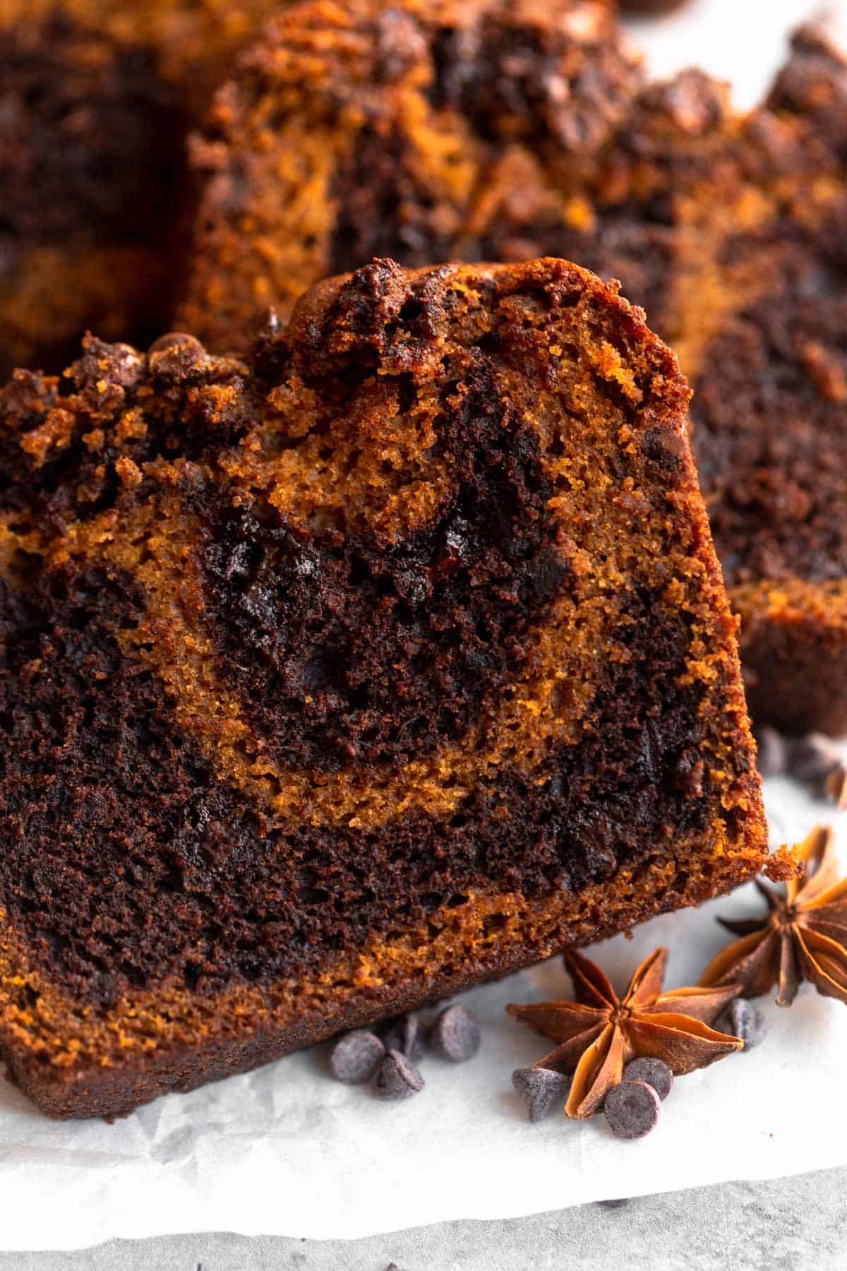 angled view of the marble pumpkin loaf with chocolate chips