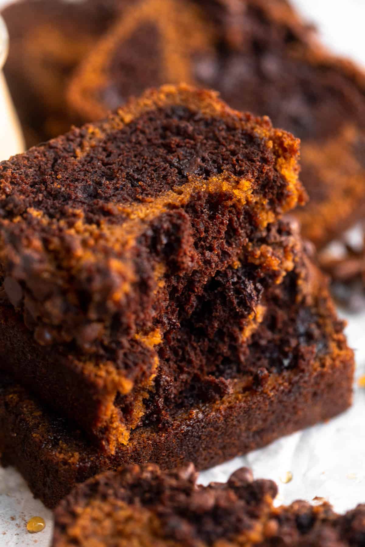 gluten free marble pumpkin loaf ripped in half to show texture