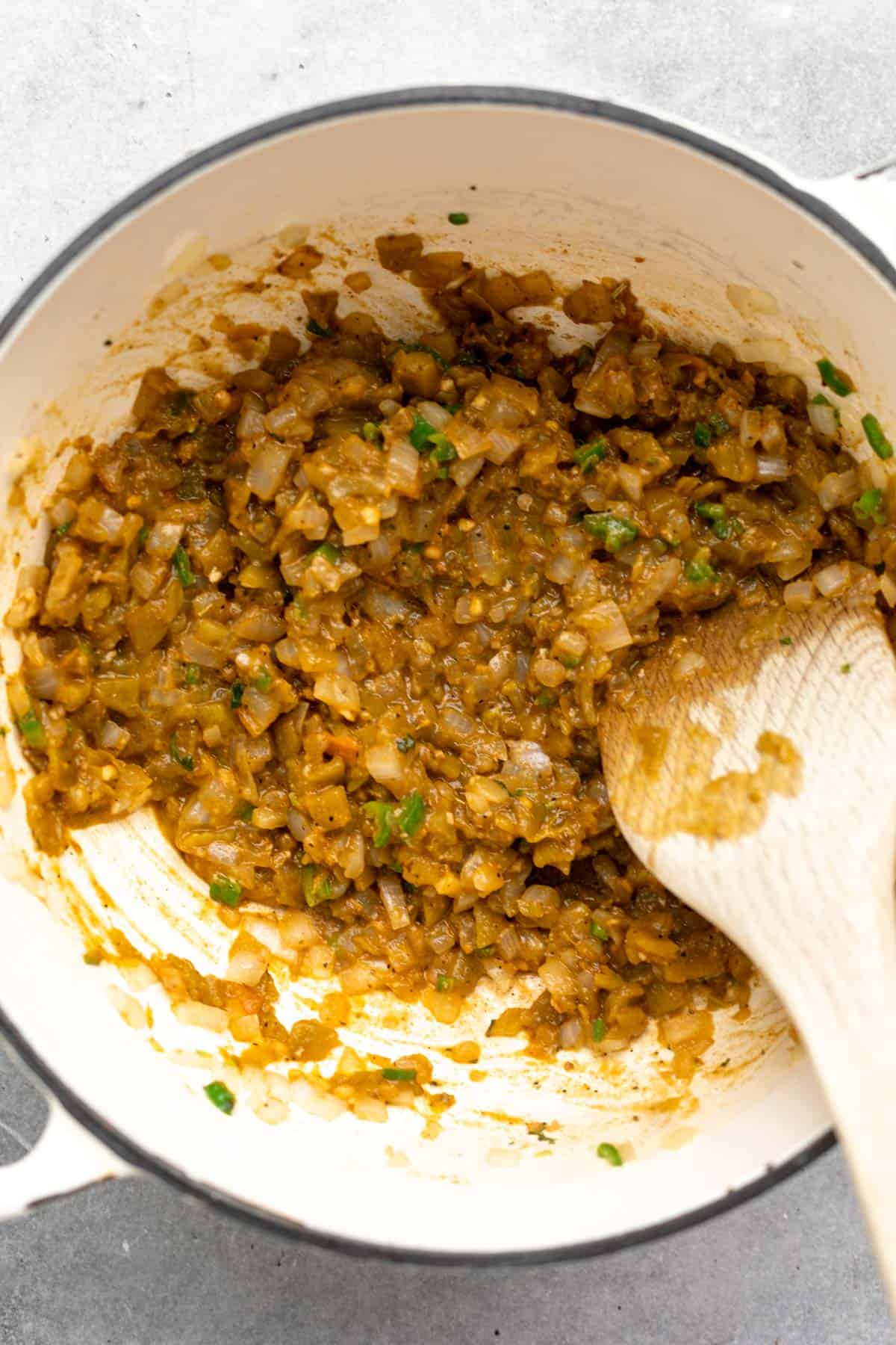 spices and green chiles in a pot